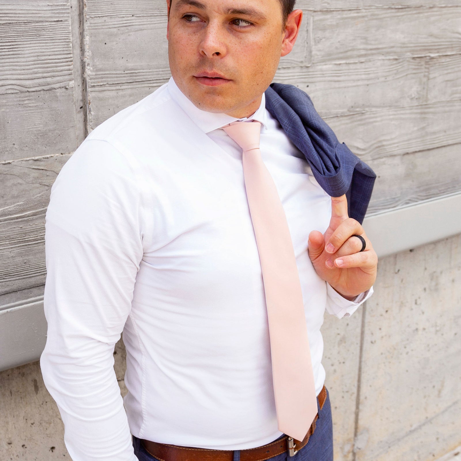 Man wearing a blush tie