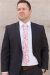 Man wearing dusty rose floral tie