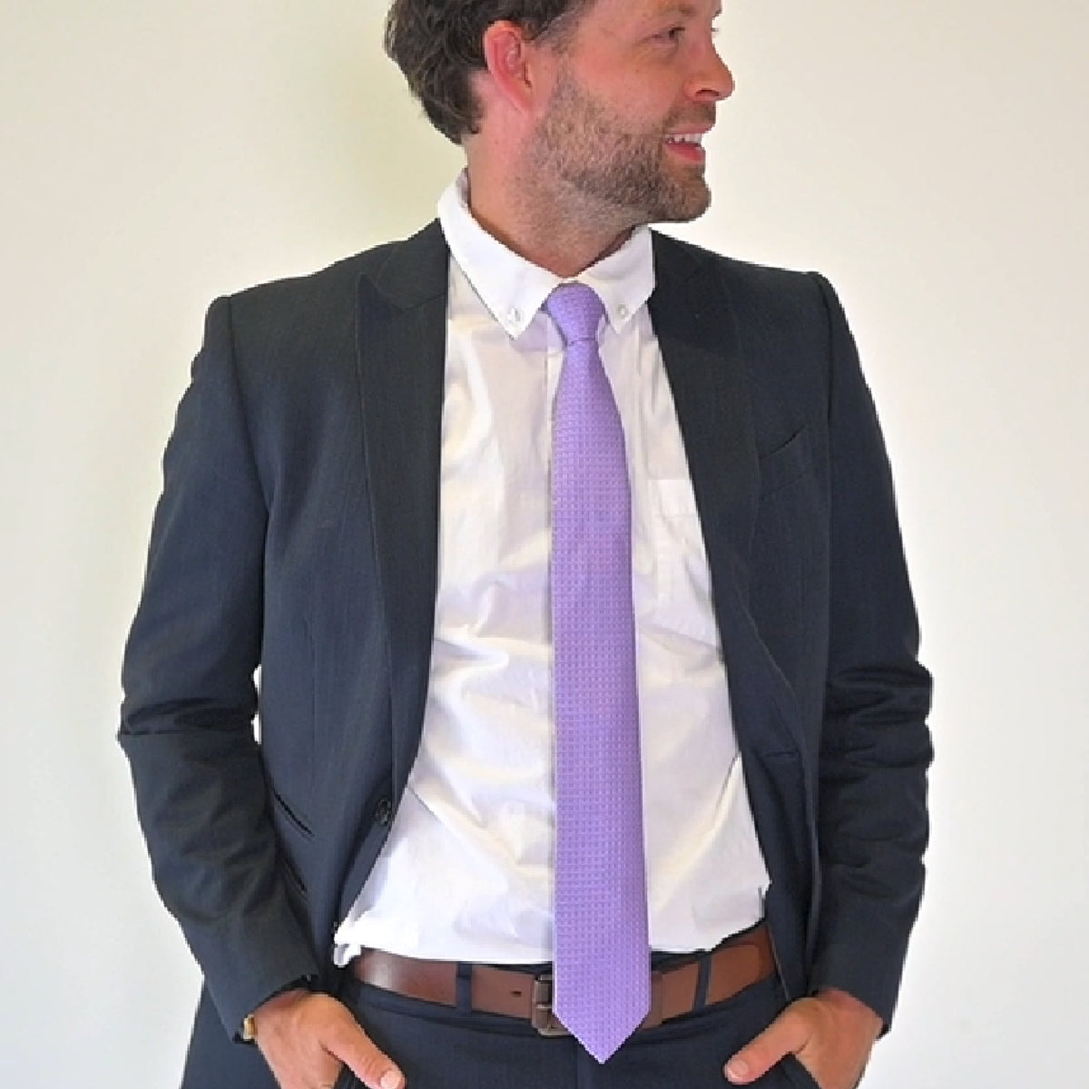 Man featuring Armoniia purple tie