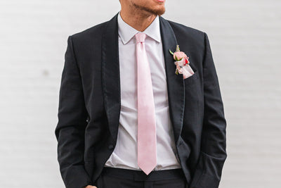 Man wearing Armoniia blush pink tie