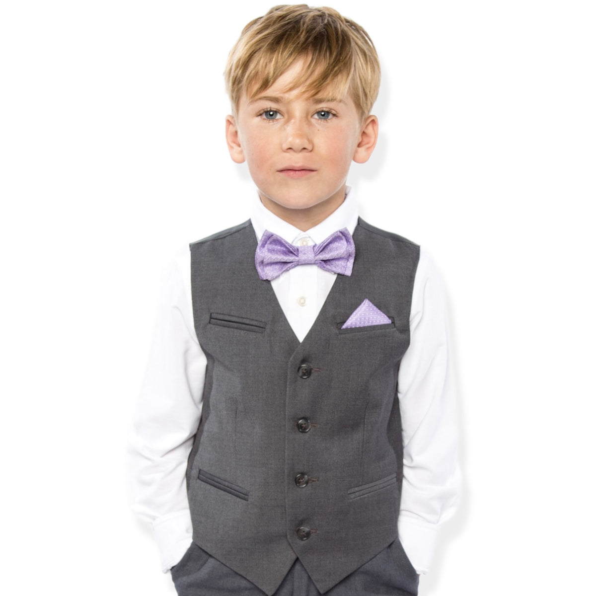 Boy wearing purple bow tie and pocket square