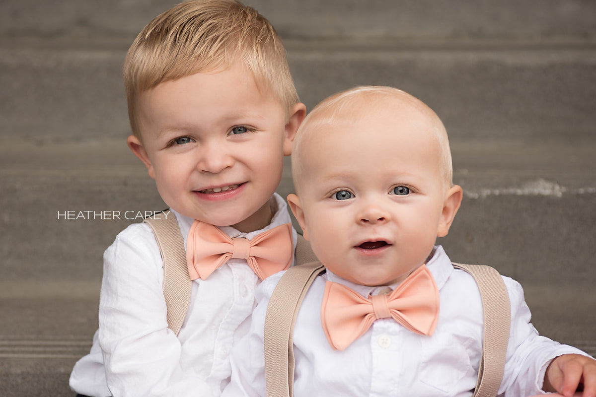 Two boys featuring Armoniia peach bow ties