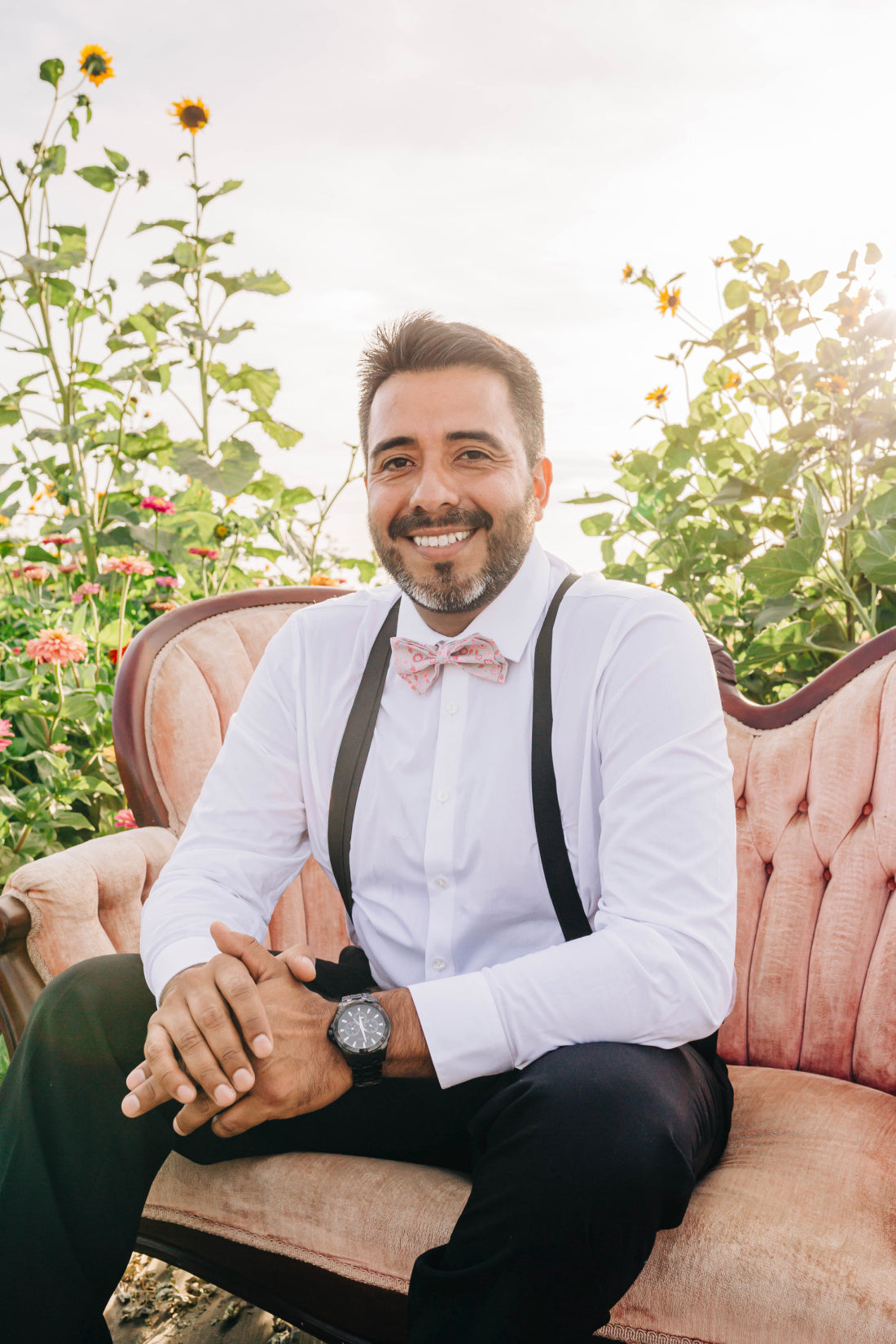 Groom Wearing Black Suspenders &amp; Grey Pink Floral Bow Tie